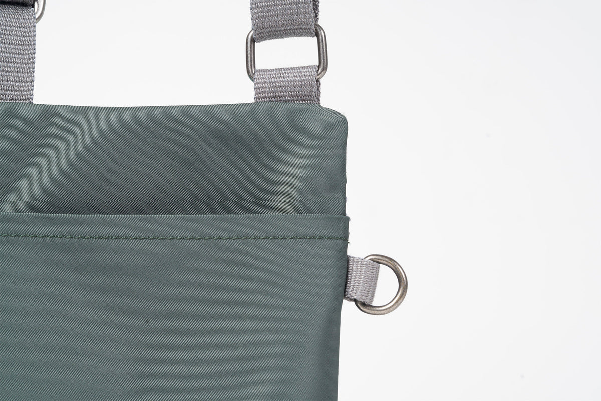Chelsea Pocket Sling Bag Small In Thyme